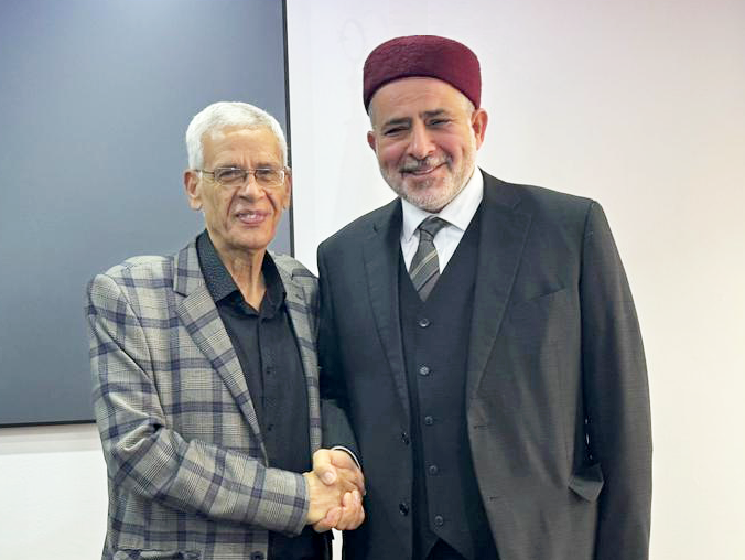Dr. Nayed Congratulates Dr. Hussadi for the publication of his Autobiography